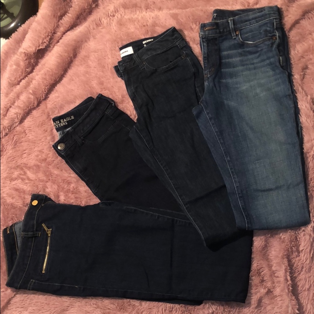 Lot of 4 brand name jeans. MICHAEL KORS INCLUDED
